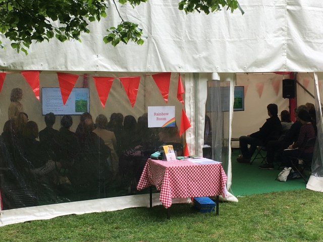 Image of marquee with presentation going on inside - Karen Inglis